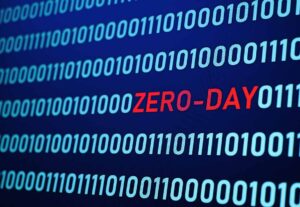 a string of blue zeroes an ones, and the word ZERO-DAY in red and capital letters in the middle.